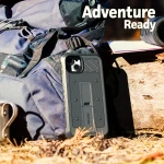 Tourist backpack, hat, binoculars and a map on a log in the fore